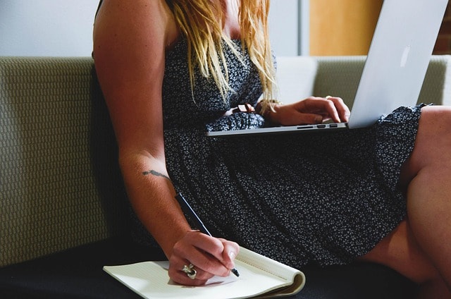 woman writing effective google ads